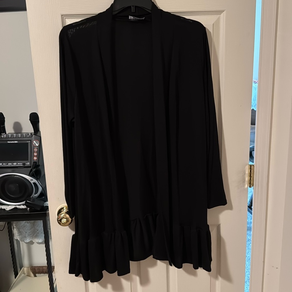 Long cardigan with ruffles on bottom viscose polyester and spandex